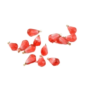 Translucent pomegranate seed pendants with faceted resin and golden loops for DIY jewelry