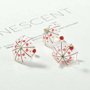 Cute gradient acrylic umbrella earrings with red heart patterns and gold metal details
