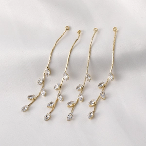 18k gold-plated willow leaf tassel jewelry components with marquise zircons on white silk