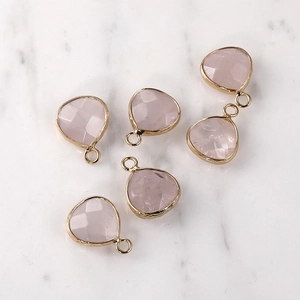Five-piece set of faceted pink quartz waterdrop pendants with gold-plated metal borders