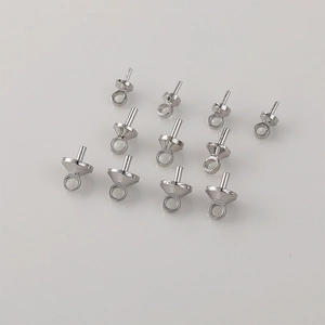 Detailed view of silver-plated eye pin bail pearl caps for DIY jewelry making