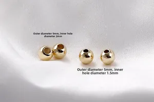 Makroaufnahme von 5mm 14K vergoldeten Zwischenperlen mit 1,5mm und 2mm Lochgröße