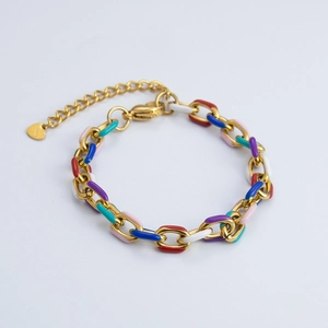 Macro view of 18k gold plated stainless steel bracelet with colorful enamel chain links