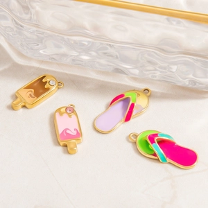 Golden stainless steel summer pendants featuring enamel ice cream and flip flop designs