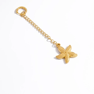 Golden starfish pendant with textured finish and 18K gold plating on a fine chain