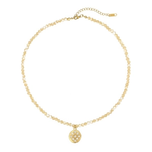 Witte schelpparel ketting met gouden sterrenhanger en fonkelende zirkonia accenten