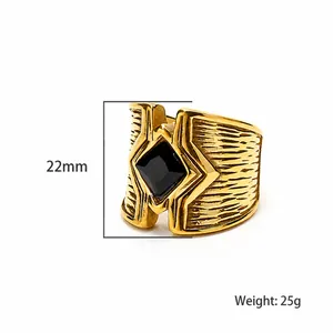 Vintage Herrenring aus goldfarbenem Edelstahl mit schwarzem Stein und Textur
