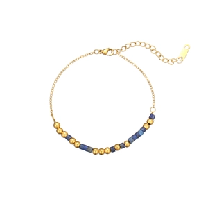 Bracelet minimaliste en acier inoxydable avec perles dorées et pierres cylindriques bleues