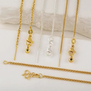 Detail of 18k gold plated Chopin chains with various lobster clasps and textures