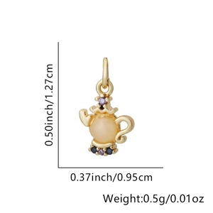 Macro view of teapot pendant with dimensions 1.27cm height and 0.95cm width in gold plating