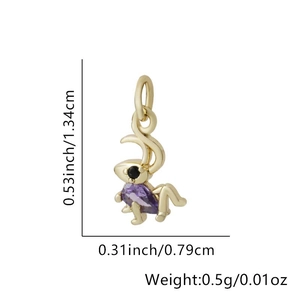 Close-up of rabbit pendant with purple pear-shaped stone and 18k gold plating