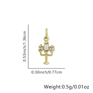 Macro view of gold candelabra pendant with square zircons showing 1.36cm height detail