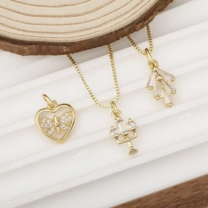 French vintage gold pendant necklace set with heart butterfly and cactus designs