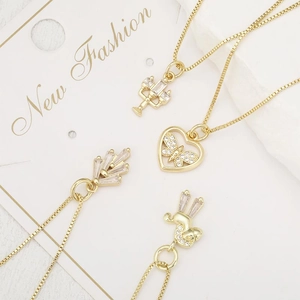 French vintage gold necklaces with cactus heart and rabbit pendants set with zircon