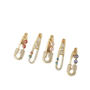 Colgantes imperdibles bañados en oro 18K con circonitas de ojo turco en 5 colores
