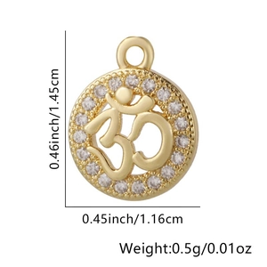 Macro shot of gold-plated Om pendant with white rhinestones and specific size measurements