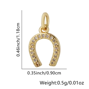 Macro detail of a gold horseshoe pendant with zircon pavé setting and size measurements