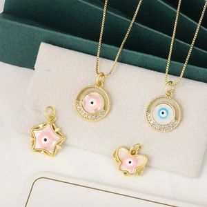 Gold Evil Eye heart and star pendants necklace set with pink zircons and mother of pearl