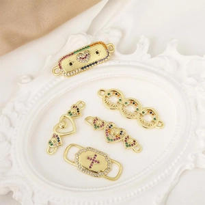 Macro detail of 18K gold plated connectors with colorful zircon micro-paving for DIY jewelry