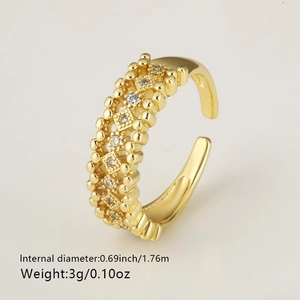 Detail of 18k gold plated ring with rainbow cubic zirconia stones and adjustable opening