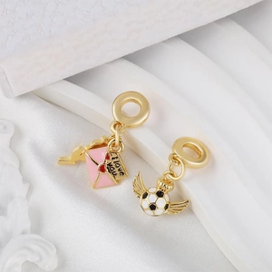 18k gold plated charms including pink I love you envelope and winged soccer ball styles