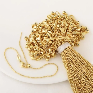 Detail of 18k gold plated adjustable bamboo chain with lobster clasp for DIY jewelry