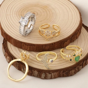 Detailed set of vintage palace style open rings with colorful gemstones and zirconia