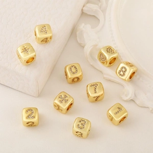 Perline cubiche placcate in oro con numeri e simboli in zirconi per gioielli DIY