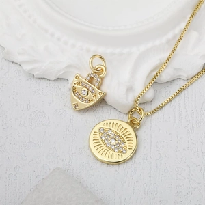 Gold Evil Eye micro-paved pendant necklace set with round and shield charms in box chain