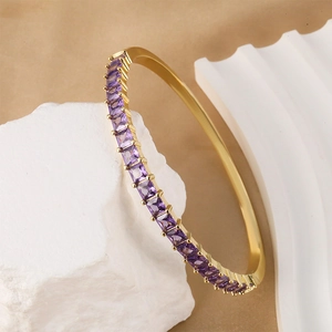 Luxurious 18K gold plated copper bracelet with square-cut purple cubic zirconia stones