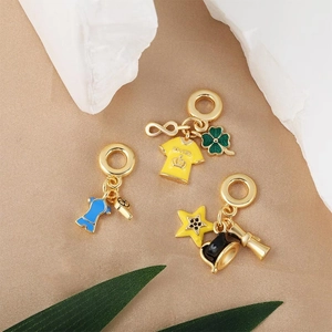 DIY charm pendants with soccer jersey and clover designs in colorful gold alloy