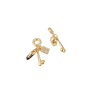 Golden baseball charm set with bat, hat and heart zircon on minimalist white background
