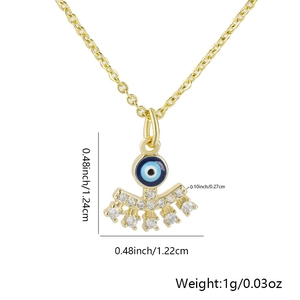 Specifiche dimensionali del ciondolo malocchio dorato con altezza 1,24 cm e peso di 1 g