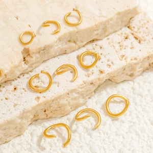 Minimalist 18K gold plated stainless steel ear bone clips on natural stone base