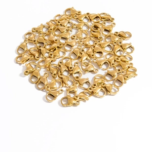 Close-up of bulk 18K gold-plated lobster clasps for DIY jewelry making and repairs