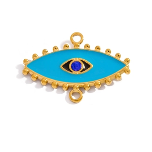 Close-up of golden evil eye connector with blue enamel and crystal for jewelry making