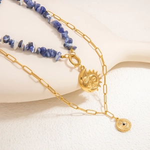 Dubbellaagse 18k vergulde ketting met zon-maan hanger en natuurlijke blauwe steentjes