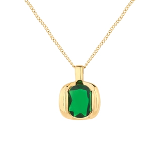 Macro detail of rectangle emerald green gemstone pendant with polished gold setting