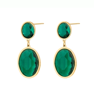 Macro shot of vintage emerald geometric earrings with multifaceted green gemstones