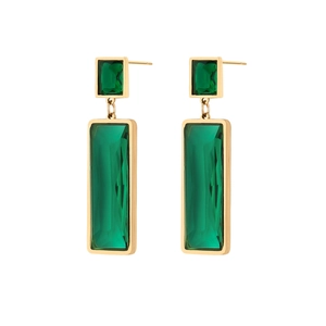 Macro shot of emerald rectangle earrings with elegant gold geometric metal plating