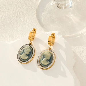 French vintage oval cameo earrings with gold plating and sparkling crystal accents