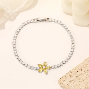 Luxuriöses Edelstahl-Tennisarmband mit gelbem Sonnenblumenanhänger und Zirkonia-Besatz