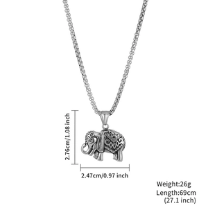 Detail of vintage silver elephant pendant showing 2.76cm dimensions and tribal texture