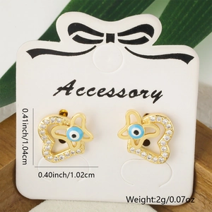 Detailed view of evil eye butterfly stud earrings with gold plating and cubic zirconia