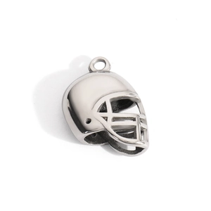Detailed macro view of a silver polished metal American football helmet charm pendant