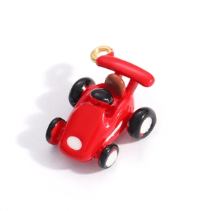 Detailed view of a red race car alloy charm with enamel finish for DIY jewelry making