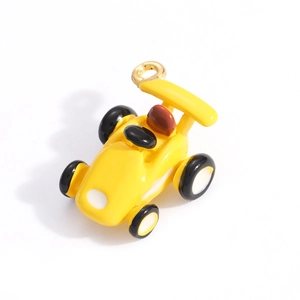 Close-up of bright yellow racing car enamel alloy pendant for DIY jewelry and keychains