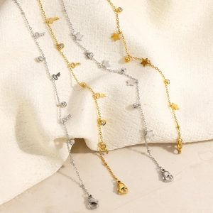 Minimalist 18k gold plated stainless steel bracelet with star key charms and crystals