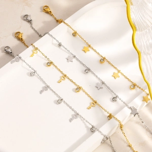 Minimalist 18k gold plated stainless steel bracelet with star, key and zircon charms