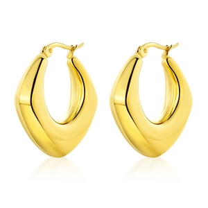 Detailed close-up of polished gold-plated teardrop earrings with mirror finish
